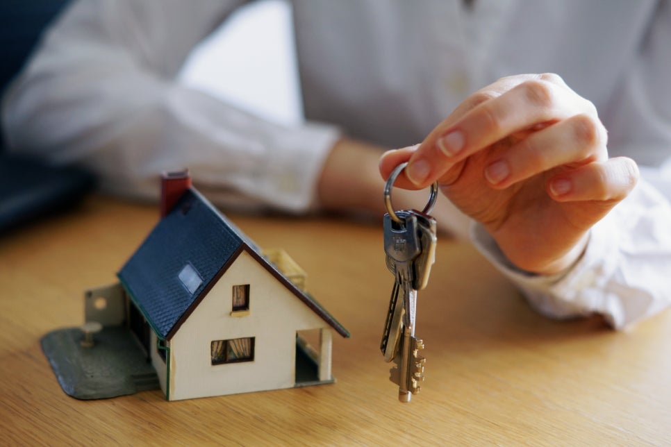closeup-shot-person-thinking-buying-selling-house.jpg